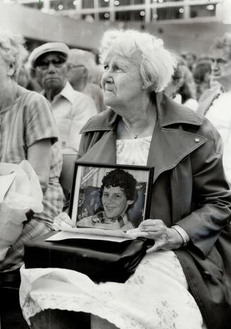 Bravest of the brave: Florence Britton, 80, clutched her framed color photograph of Terry Fox in Nathan Phillips Square yesterday at special memorial services attended by more than 1,500 people