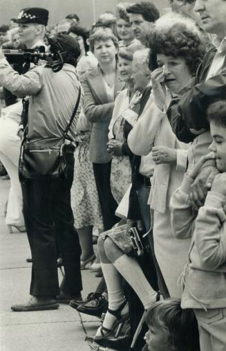 Misty-eyed Metro woman is overcome by emotion during the salute to Terry Fox day in Metro yesterday
