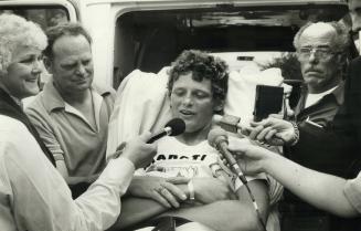 Terry Fox with his mother and father at his side gives his final Marathon of hope Press conference in Thunder bay Tues before he was taken to The airport by Ambulance
