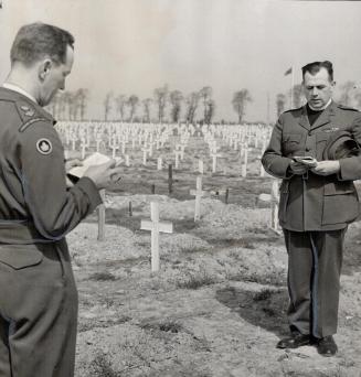 Ashes of an unknown Canadian soldier which were brought to Canada and returned to Normanday are buried by Maj