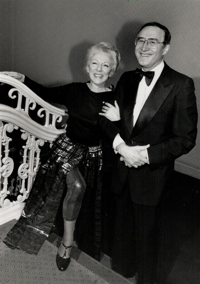 Above, Celia Franca, founder fo the National Ballet, wearing an an outfit by Ottawa designer Nicola Lang, is escorted by Arnold Spohr,retired artistic director of the Royal Winnipeg Ballet