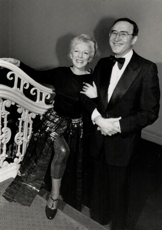 Above, Celia Franca, founder fo the National Ballet, wearing an an outfit by Ottawa designer Nicola Lang, is escorted by Arnold Spohr,retired artistic director of the Royal Winnipeg Ballet
