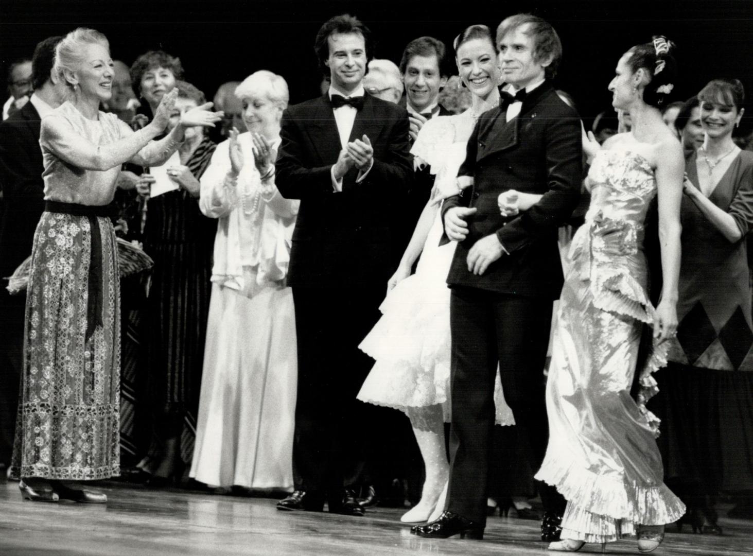 Appleause! Applause! National Ballet founder Celia Franca (left) acknowledges the applause of the company's principal dancers, Frank Augustyn, Tomas S(...)