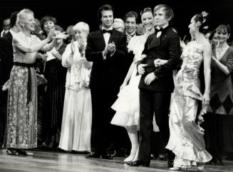 Appleause! Applause! National Ballet founder Celia Franca (left) acknowledges the applause of the company's principal dancers, Frank Augustyn, Tomas S(...)