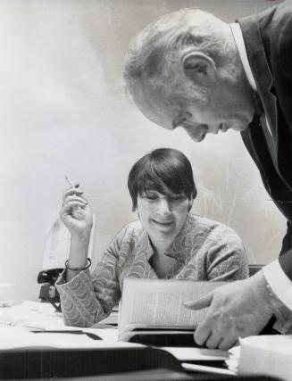 Getting together with Pierre Berton, Elsa, as his TV producer, goes over his program schedule