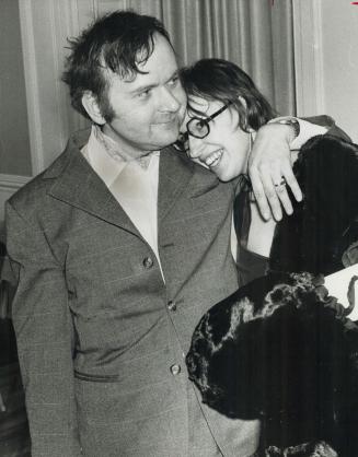 Mrs. Robert Coltri congratulates author. David Freeman's Creeps won $5,000 Chalmers Award