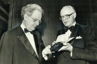 Called Canada's greatest living scholar, Northrop Frye (left) receives 1978 Royal Bank Award of $50,000 and gold medal from W. Earle McLaughlin, chair(...)