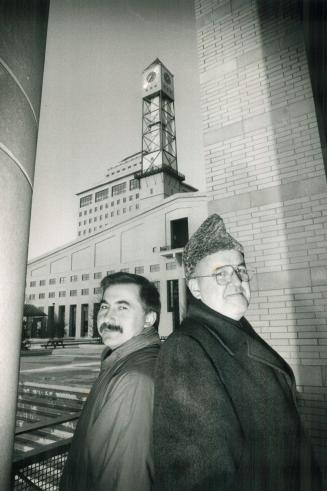 Some say yes others say nyet. Love-hate relationship with Mississauga City Hall: To film-maker Felix Bednarski (left) it's Moscow West architechture. (...)