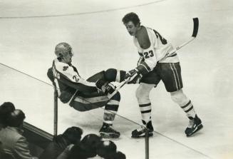 Oops! sorry, B.J.Leaf's Borje Salming falls victim to Bob Gainey, diligent Montreal Canadians' winger who not only is bigger than most people think (6(...)