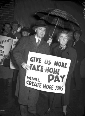 Toronto Controller Stewart Smith and Alderman May Burchard with signs, Canadian Seamen's Union strike