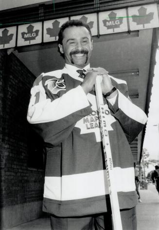 King Fuhr a day: It was a happy day in Leafland as Grant Fuhr donned the blue and white outside Maple Leaf Gardens, where he'll face his former Edmonton mates tonight