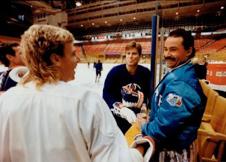 King Fuhr a day: It was a happy day in Leafland as Grant Fuhr donned the  blue and white outside Maple Leaf Gardens, where he'll face his former  Edmonton mates tonight –