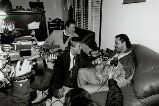 He's gone, Fuhr Real: Mapie Leafs goaltender Grant Fuhr shares a laugh with the media at his home last night after learning of his trade to the Buffalo Sabres