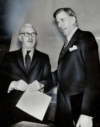 Retiring president John Kenneth Galbraith (right) and former Liberal finance minister, Walter Gordon, discuss day's events at the annual meeting of th(...)