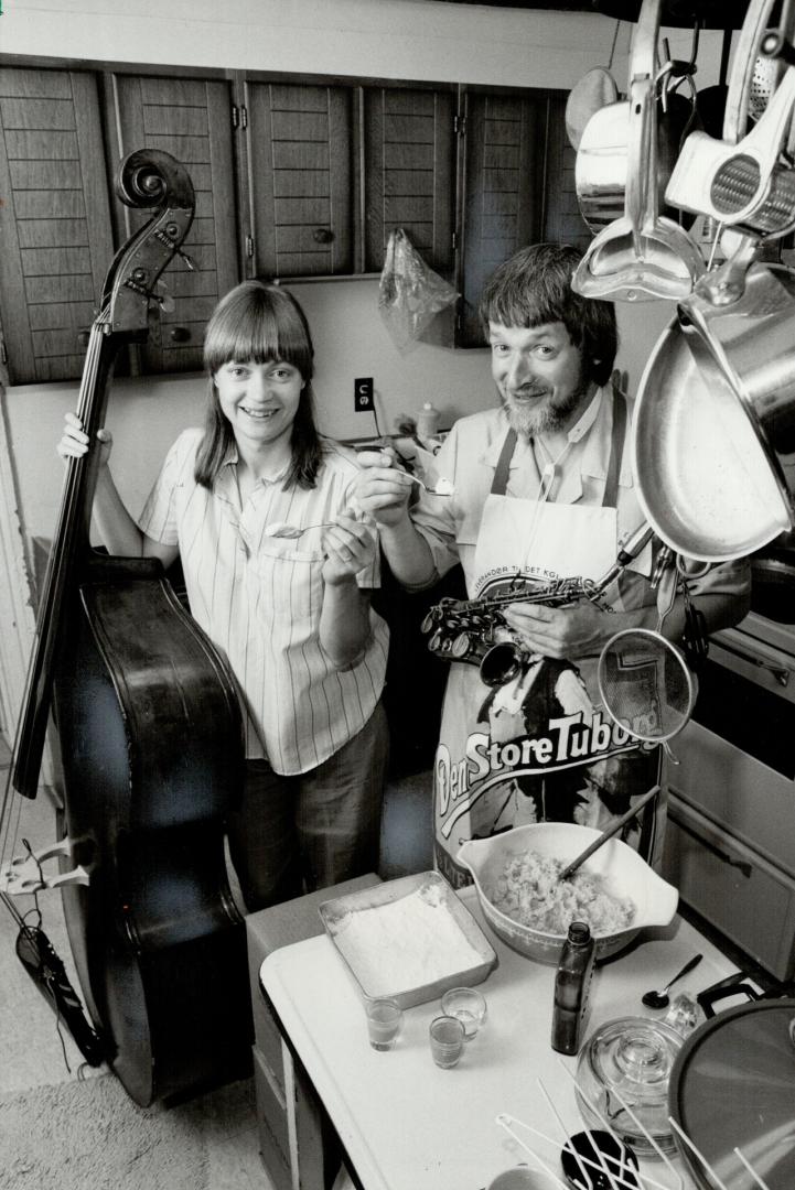 Metro Stompers' Jim Galloway and wife Rosemary whip up an oatmeal dessert in the kitchen of his mid-town home, a 130-year-old former farmhouse