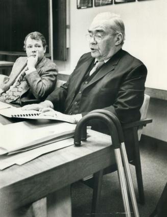 Toronto Mayor David Crombie listens intently as Frederick G