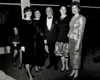 Above, Arthur Gelber surrounded by his daughters