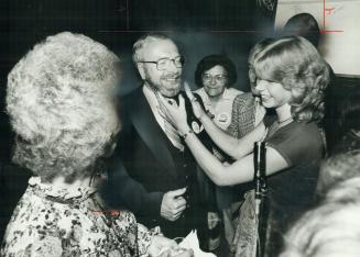 Gordon Gilchrist is greeted by his daughter Patti, after winning in Scarborough-East