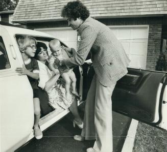 Paul Godfrey and his family getting into a car