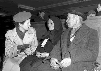 ''Displaced persons'' from Europe with Red Cross worker