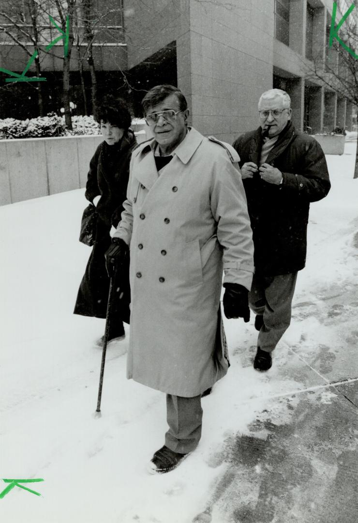 Marlon Rizk w/wife Marilyn and lawyer Norman Matusiak