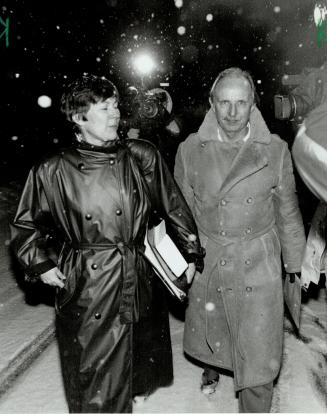 Faces 21 Charges: Robert Ross, former chief psychologist at reform school for girls, leaves Ottawa courthouse yesterday with lawyer Mariys Edwardh