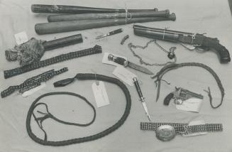 Arsenal of Weapons which police say was captured in raid on Satan's Choice motorcycle club included whips, guns, knives, bicycle chains and baseball b(...)
