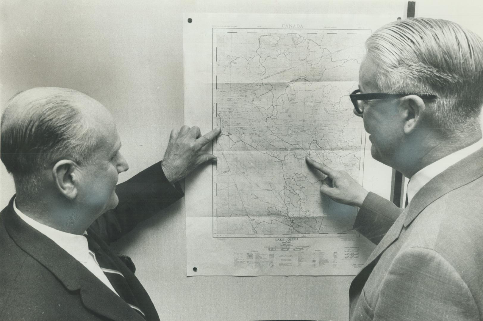 Harold Graham (left), Bernard Simmonds plot moves on map