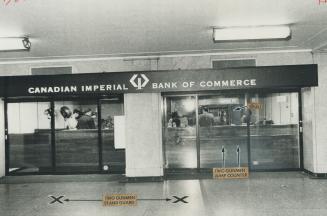 The bank that was robbed becomes a part of the lower lobby of Union Station when six glass doors slide aside to open it for business. It is on the nor(...)