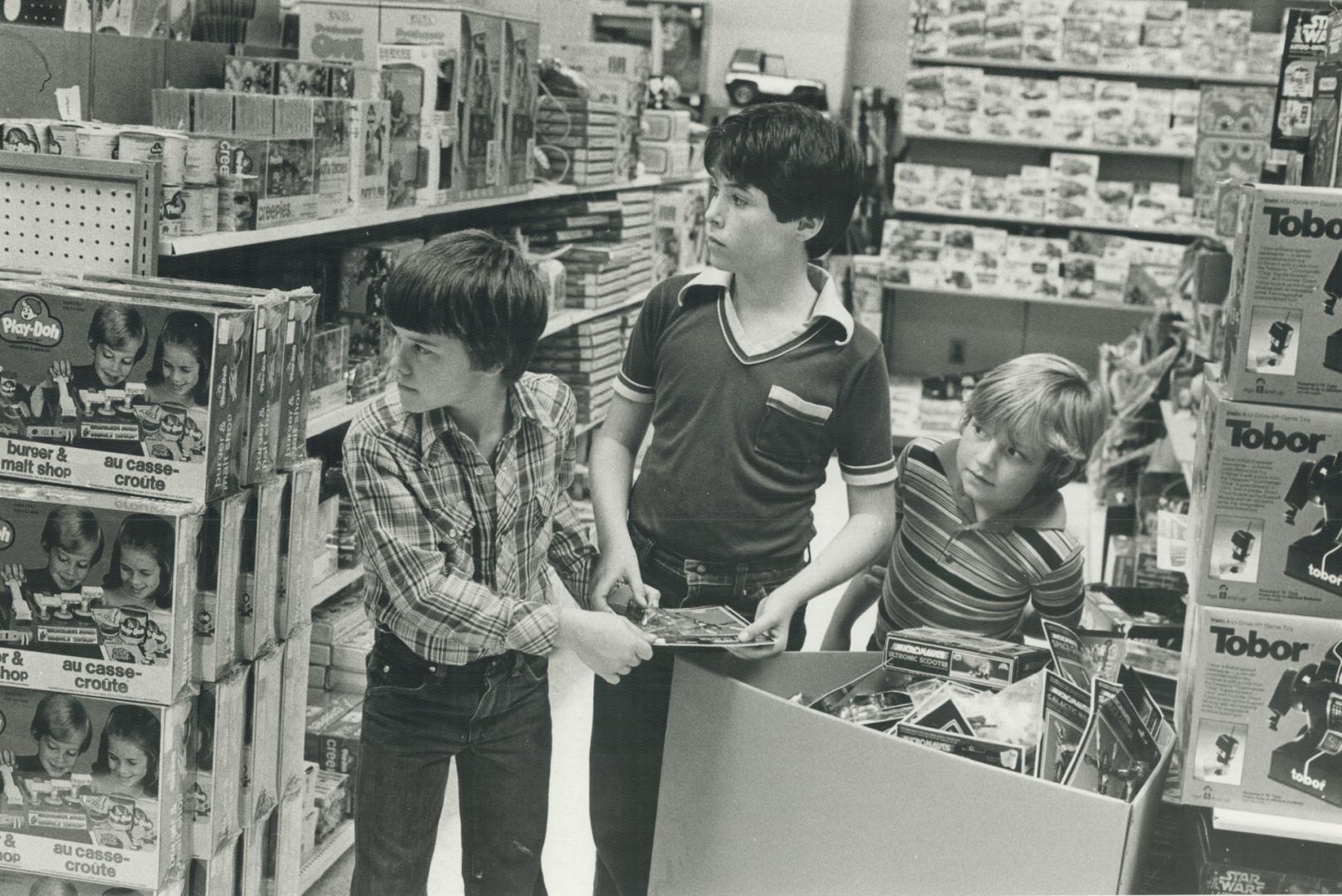 Trouble in store: Brent, Jeremy and Sammy show how it's done in the toy department of a downtown store