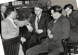 The three were arrested in Detroit, Jan