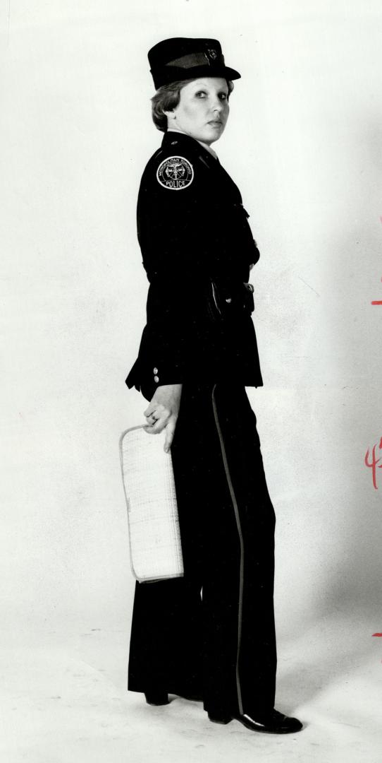 Wrong way: Dangling clutch, shoulder bag over back, open purse and protruding clutch are invitations to a thief