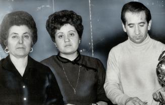 Spunky victims: Gaetana Gigante, 55 (left)and her daughter and son-in-law, Claudia and Matteo Lauriola decided to stand up to the burns who held up their shop yesterday