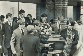 Fellow students of Slain Girl carry the casket of Gail Mohns, from College Park Church of the Seventh Day Adventists in Oshawa yesterday after funeral(...)