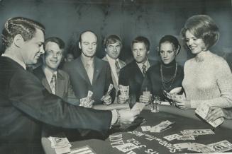 Gambling expert Bruce Irwin (left) was hired by the canadian Imperial Bank of Commerce to teach 900 staffers how to beat the house at a Millionaire's (...)