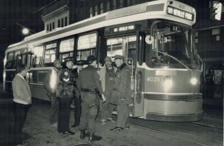 Hijacked streetcar: Members of the Metro police Emergency Task Force last night used tear gas to subdue a man who had commandeered a TTC streetcar