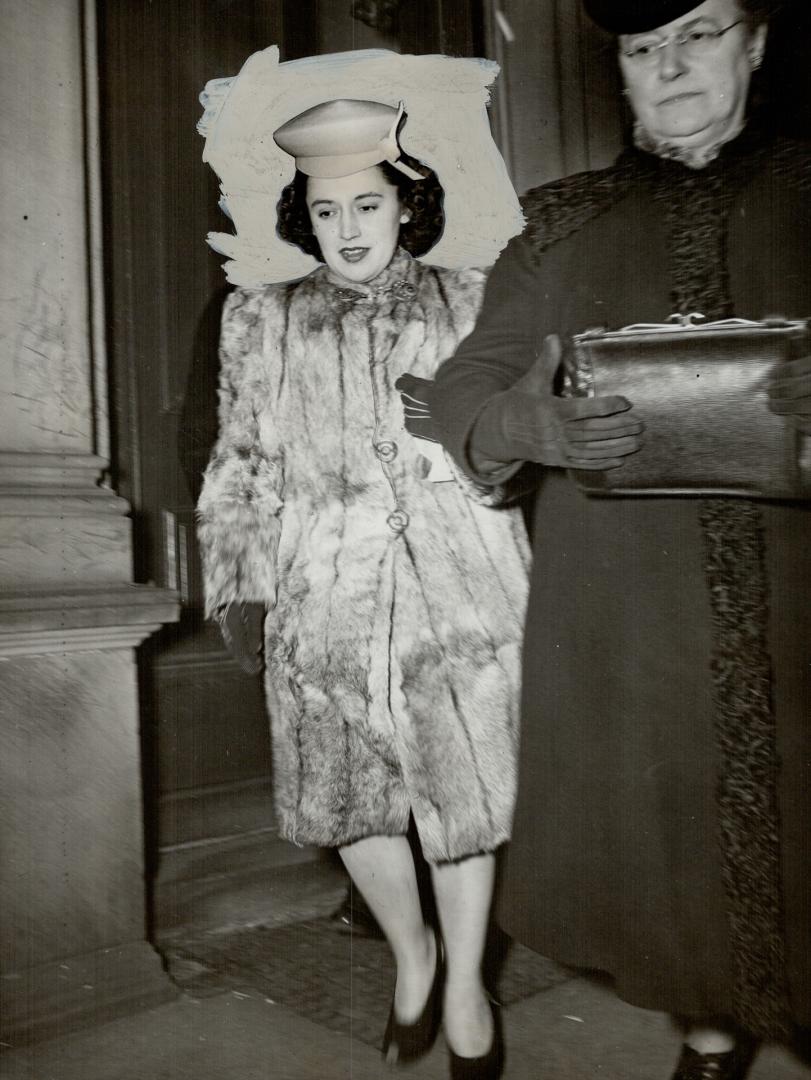 Her life at stake, Mrs. Evelyn Dick is seen in these photos taken outside court