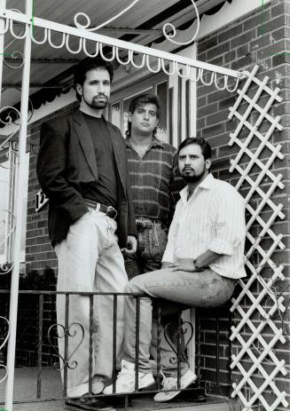 Difficult time: Brothers Mark, left, Carl and Neil Fonseca say yesterday's return of accused Kuldip Singh Samra has dredged up the pain they've tried to bury