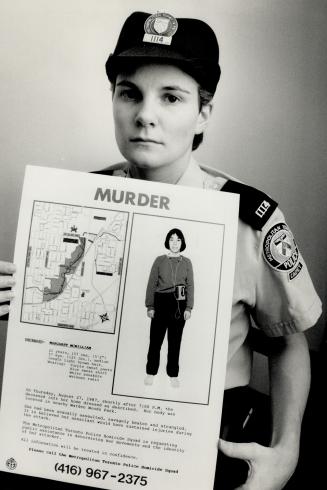 Victim's picture: Police cadet Kate Kinnear holds a poster with a picture of Margaret McWilliam, dressed as she was when attacked, along with a map of the Warden Woods park area