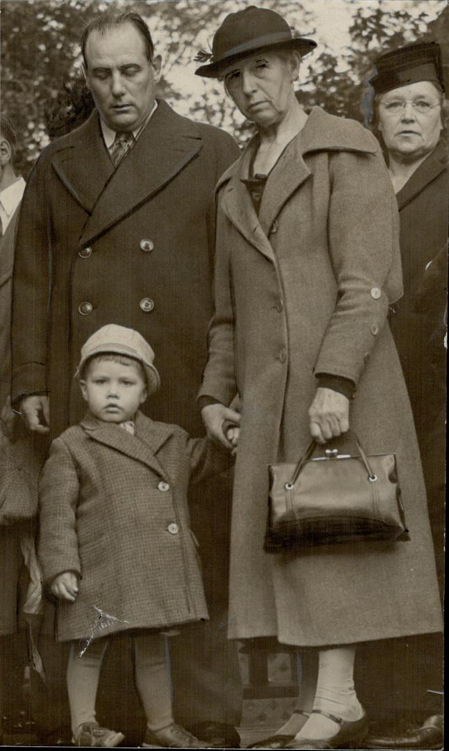 At Right are Mr. and Mrs. J. Kyrojarvi of Vineland, with the Newall's three-year-old son. They have taken care of the child since the couple became estranged