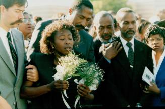 Auis Ottey - mother and Derek Ottey, 2nd from right