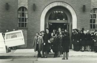 Pallbearers carry the coffin containing the body of slain crime figure Domenic Racco