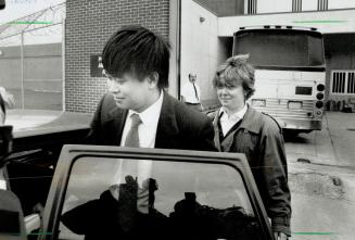 Out on bail: Rui-Wen Pan, accompanied by lawyer, Ann Tierney, leaves the Metro East Detention Centre yesterday