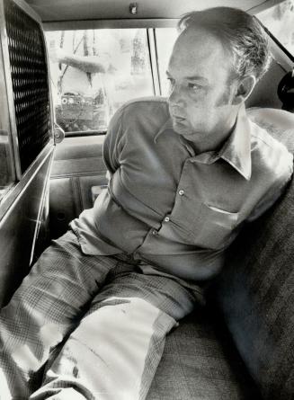 James Wilson Brown, is placed in handcuffs in the rear of a Peel Region Police cruiser toay after appearing in Brampton court on a first-degree murder(...)