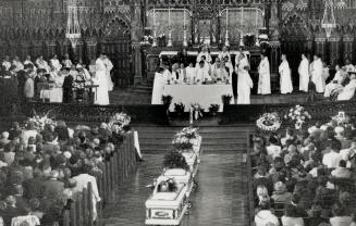 Thousands at funeral: Relatives, students and dignitaries attend service for nine of the 14 massacre victims in Montreal's Notre Dame Basilica