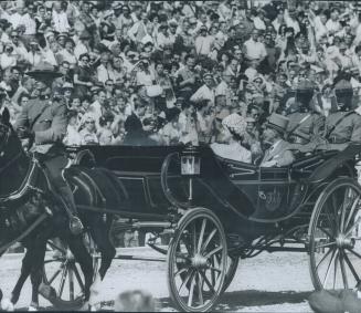 Arriving at track, the Queen Mother rides in coach with Lieutenant-Governor J