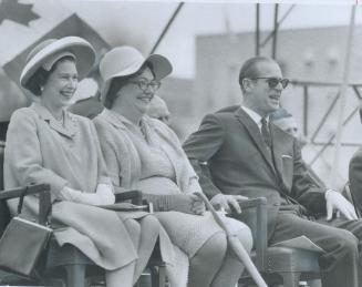 How's this for good, old-fashioned enjoyment? Queen Elizabeth, State Secretary Judy LaMarsh and Prince Philip really had a ball at the Parliament Hill folk art concert in Ottawa