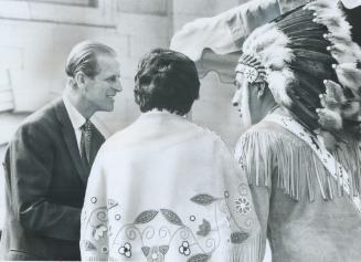 Prince Philip talks with Indians in Kingston, the heartland of the United Empire Loyalists who clung to their British ties during the American Revolut(...)