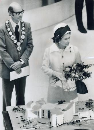 After Opening the $14 million Scarborough Civic Centre today the Queen stands by a model of it with Mayor Paul Cosgrove
