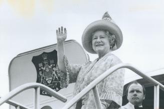 Queen Mother waves goodby at Toronto International Airport before boarding plane for London